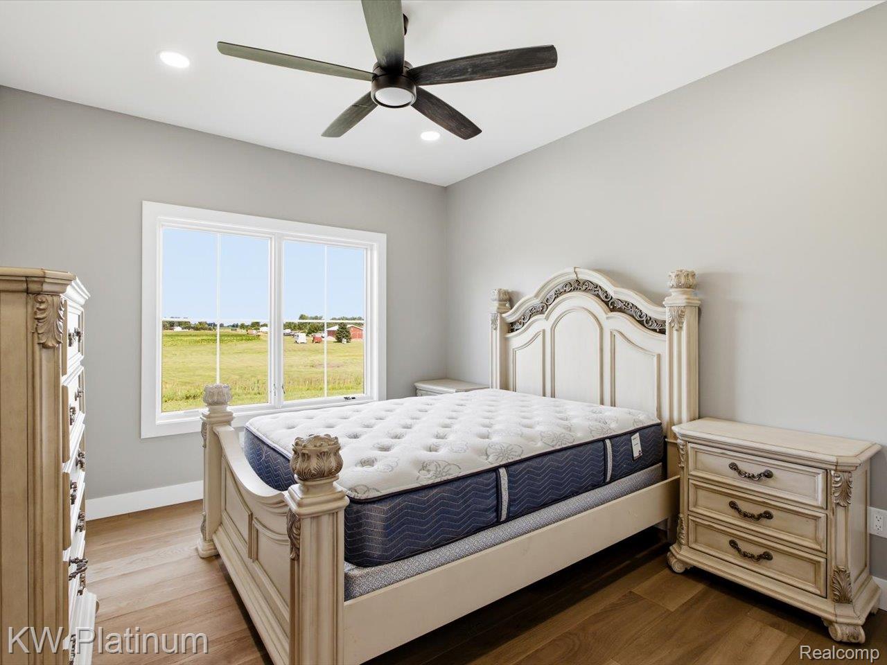 493 Wood Road Snover, MI 48472 - Photo 30 of 60 Room featuring wood-finish flooring, recessed lighting, and a ceiling fan