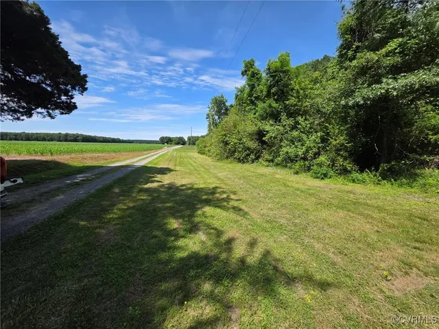 a view of a golf course with a yard