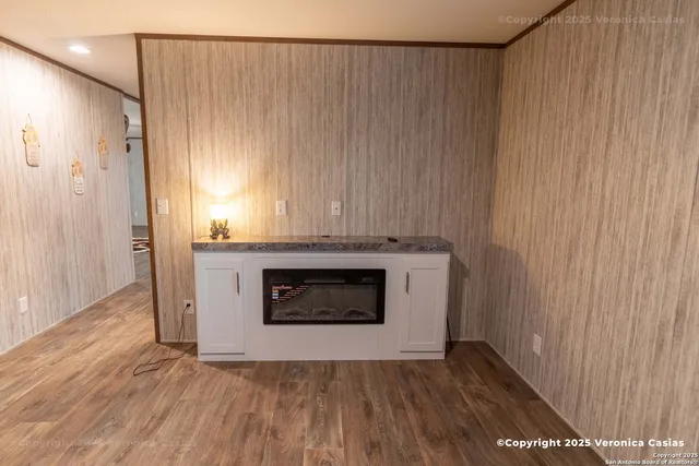 a view of a livingroom with a fireplace