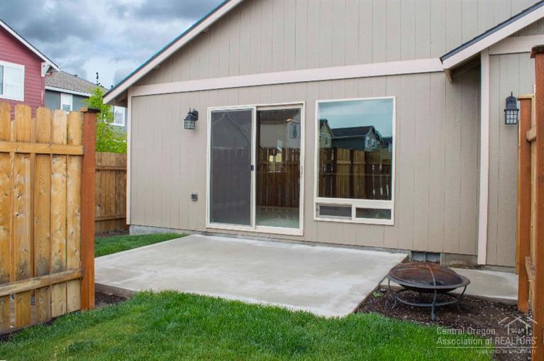 61723 Rigel Way Bend, OR 97702 - Photo 3 of 17 a front view of a house with garden