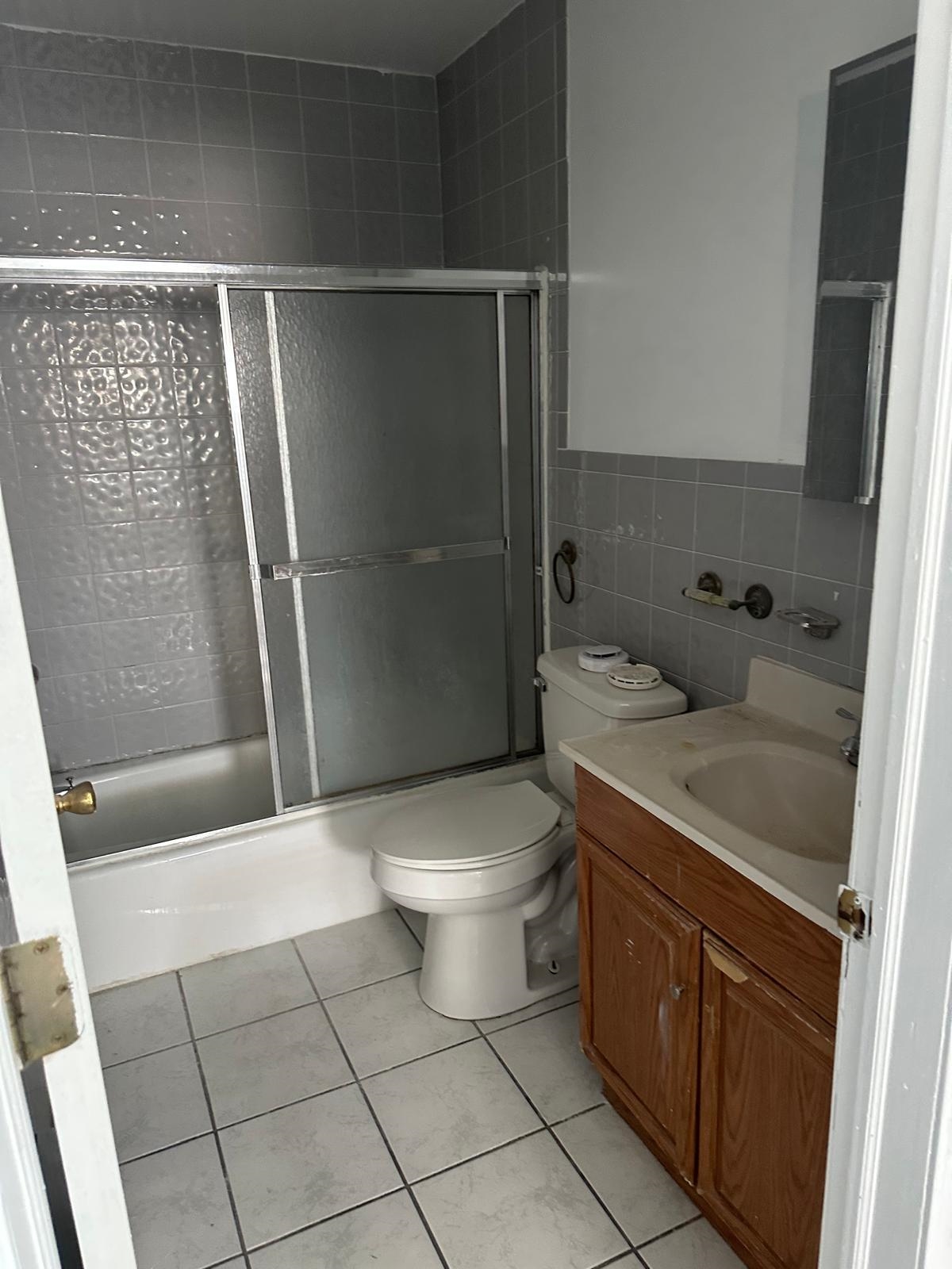 31 East 32nd Street, Unit 2 Bayonne, NJ 07002 - Photo 18 of 19 a bathroom with a toilet and a shower