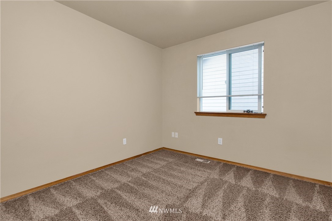 6912 Radius Loop Southeast Lacey, WA 98513 - Photo 21 of 30 an empty room with a window