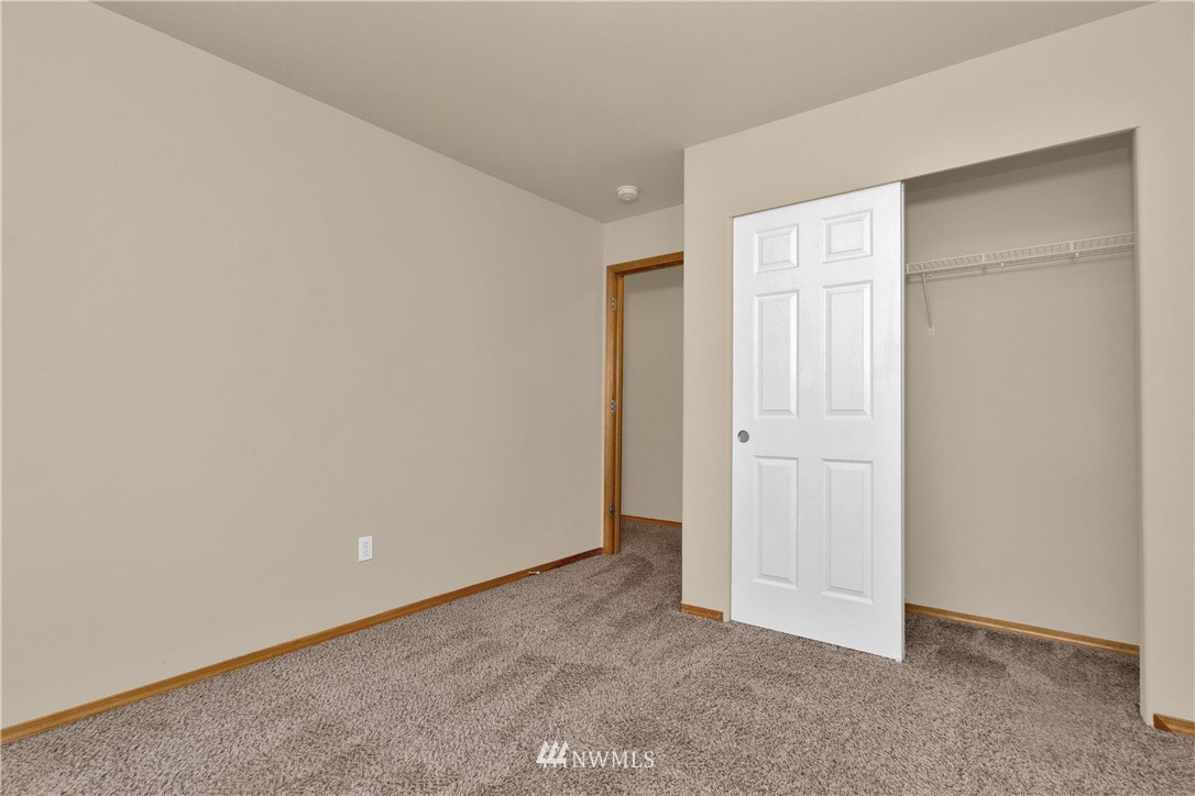6912 Radius Loop Southeast Lacey, WA 98513 - Photo 23 of 30 an empty room with closet area