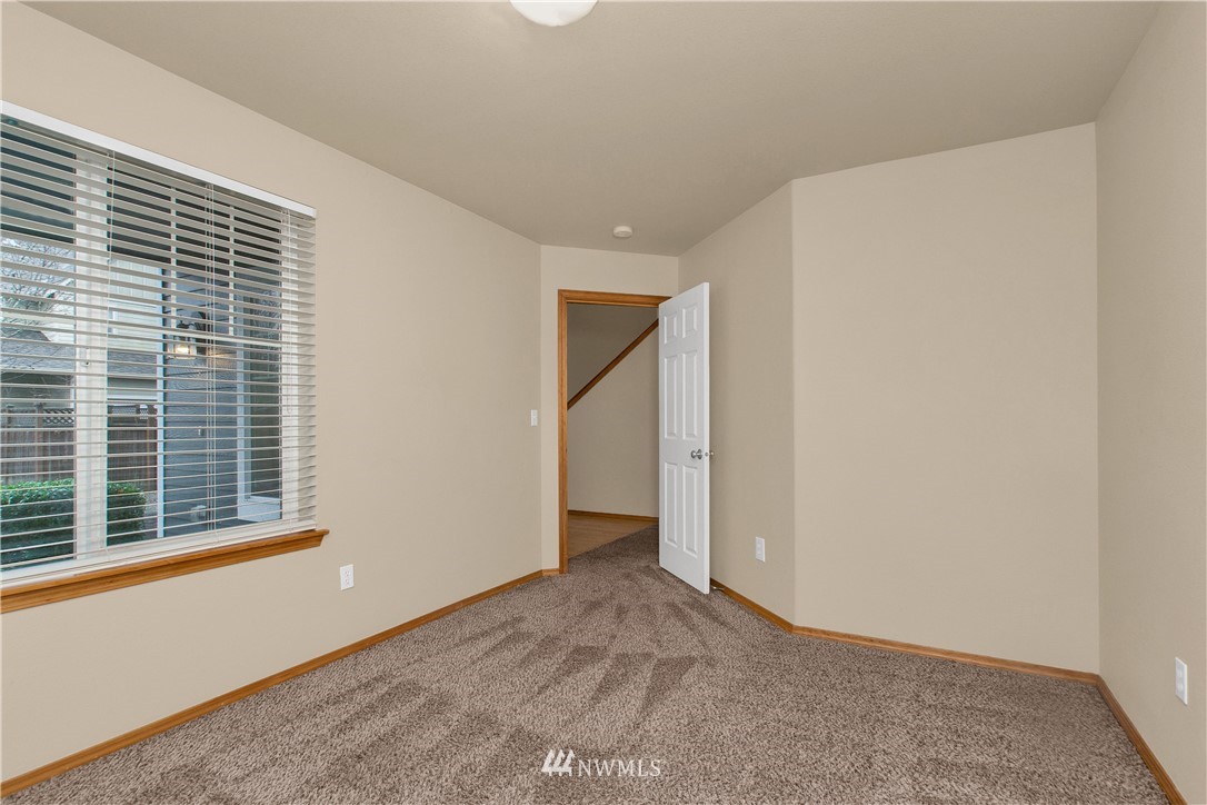 6912 Radius Loop Southeast Lacey, WA 98513 - Photo 10 of 30 a view of an empty room with a window
