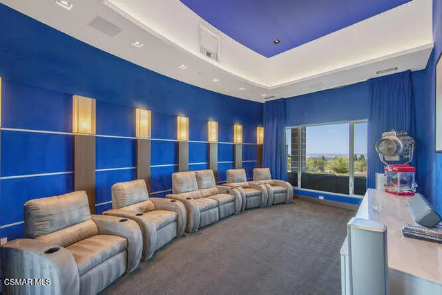 a view of a white house with a large windows