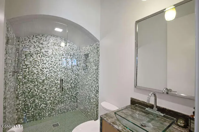 a bedroom with bed and window