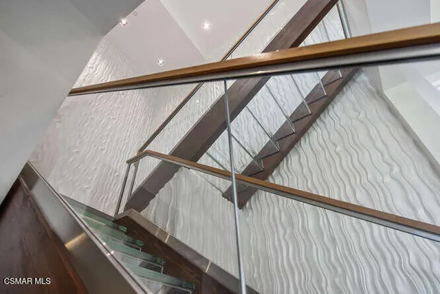 a bathroom with a bathtub and a sink