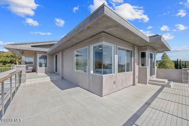 a view of a yard with an outdoor seating