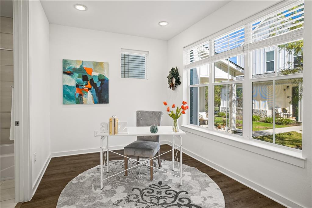 2624 Metcalfe Road, Unit 8 Austin, TX 78741 - Photo 19 of 32 Bedroom #1 includes a full ensuite bathroom located inside the room.