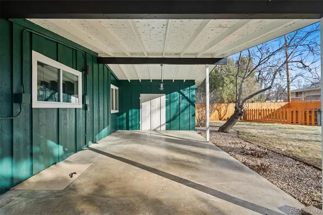 a view of a backyard of a house