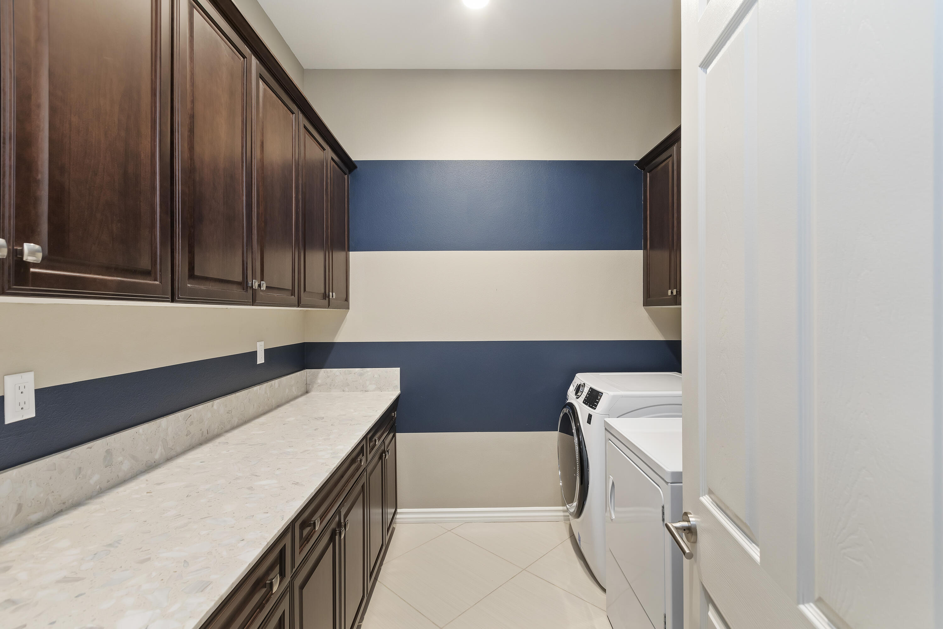 43020 Ascona Lane Indio, CA 92203 - Photo 24 of 33 a utility room with dryer and washer
