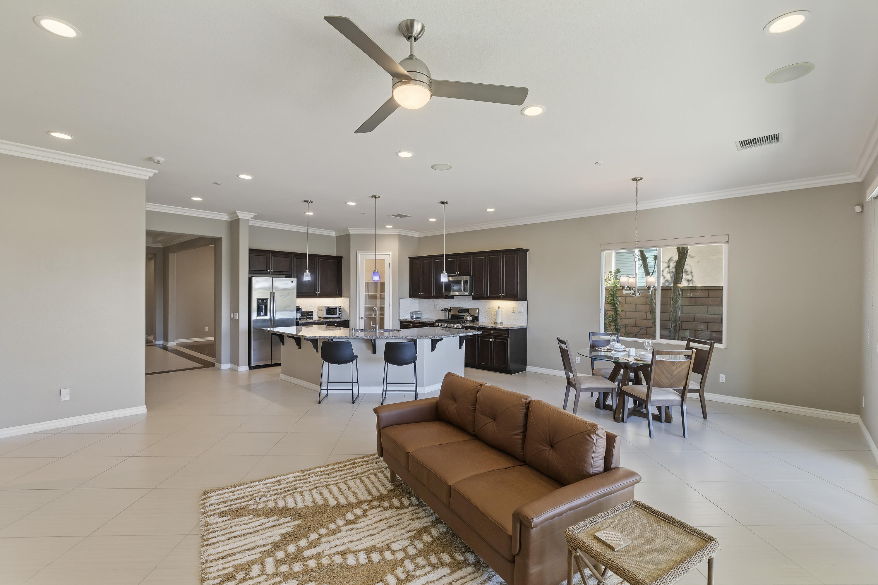 43020 Ascona Lane Indio, CA 92203 - Photo 6 of 33 a living room with furniture and view of kitchen