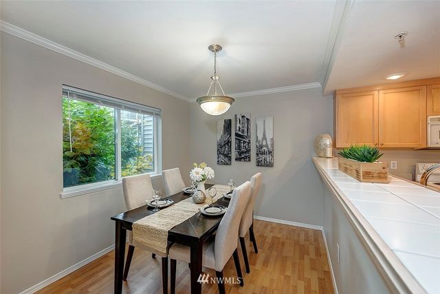 $335,000 | 25235 Southeast Klahanie Boulevard, Unit E102, Sammamish, WA 98029