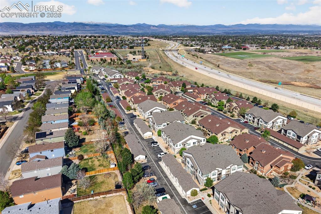 4658 Copeland Circle, Unit 103 Highlands Ranch, CO 80126 - Photo 31 of 37 an aerial view of residential houses with outdoor space