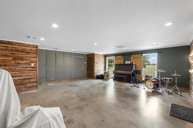 a view of livingroom with furniture and window