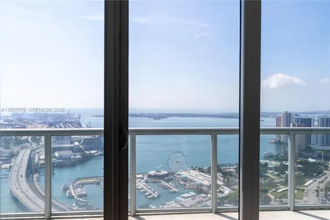 a view of a balcony with an ocean