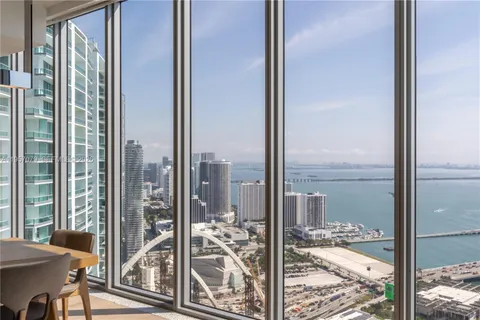 a view of a balcony and a floor to ceiling window
