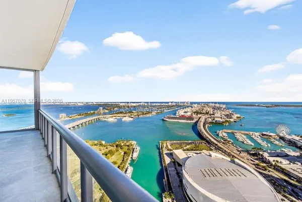 a view of a balcony with an ocean