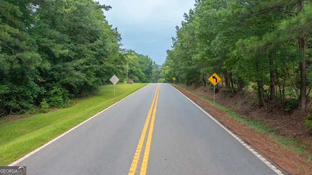 a view of a lake with a park
