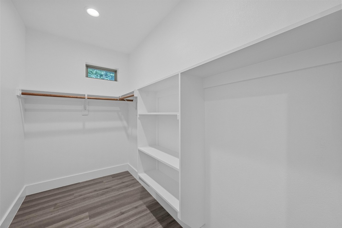 4705 Louis Avenue, Unit B Austin, TX 78721 - Photo 20 of 39 Spacious closet with wood finished floors