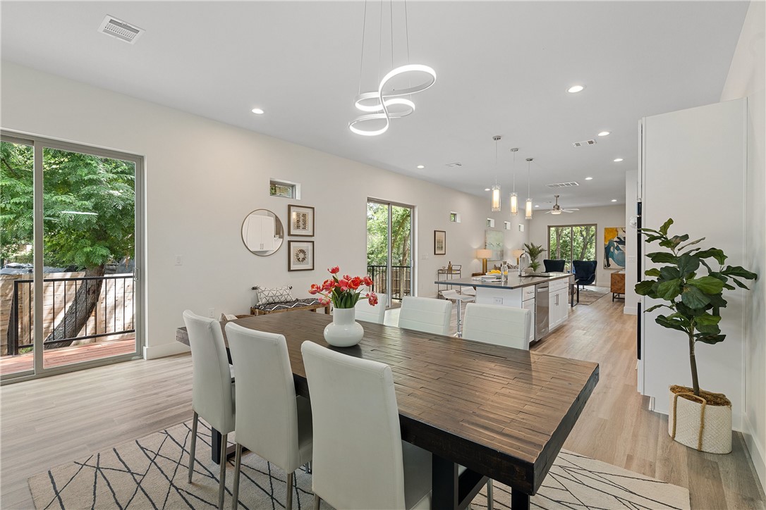 4705 Louis Avenue, Unit B Austin, TX 78721 - Photo 4 of 39 Dining space with plenty of natural light, visible vents, recessed lighting, and light wood-style floors