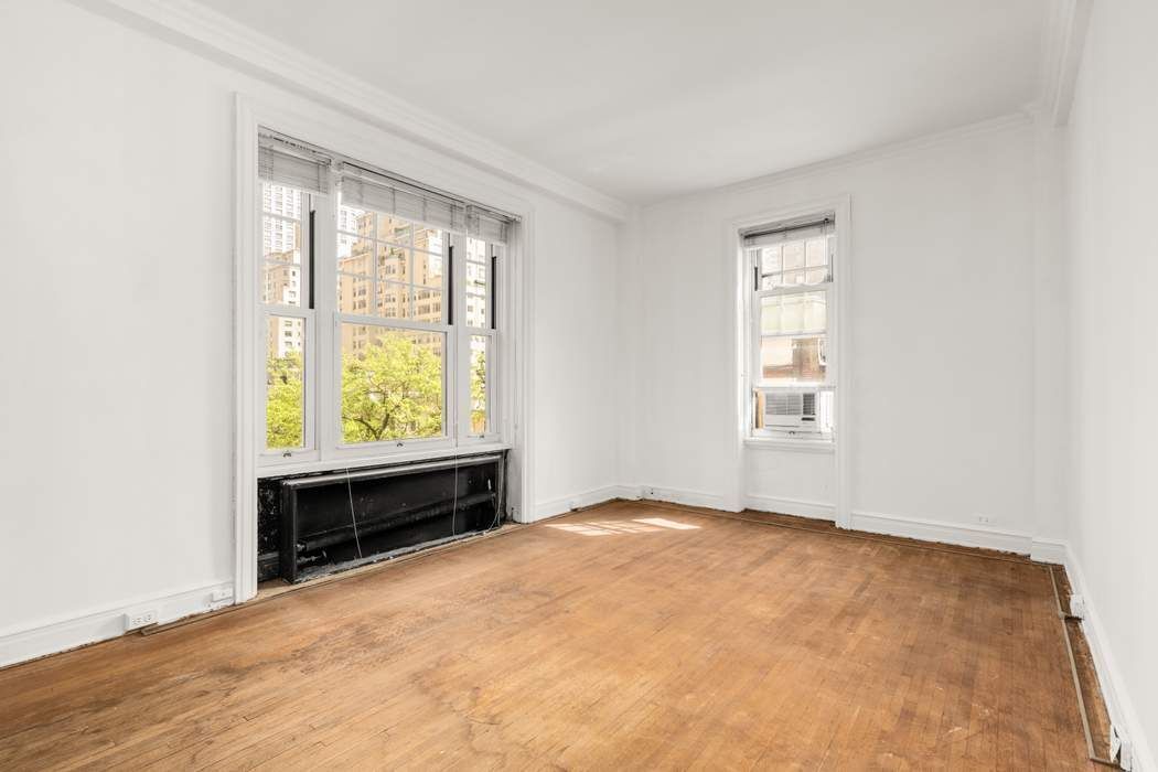 150 East 72nd Street, Unit 6S Manhattan, NY 10021 - Photo 11 of 23 a view of an empty room with a window