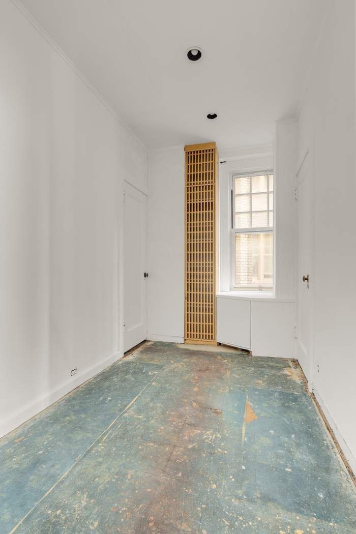 150 East 72nd Street, Unit 6S Manhattan, NY 10021 - Photo 17 of 23 an empty room with windows