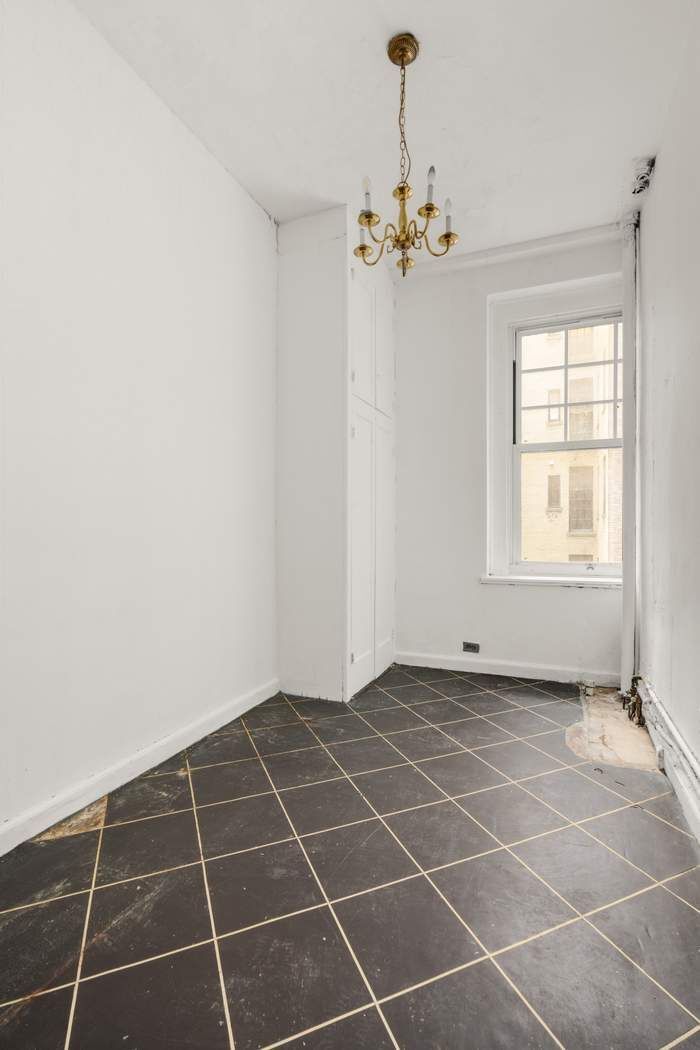 150 East 72nd Street, Unit 6S Manhattan, NY 10021 - Photo 19 of 23 a view of an empty room with a window