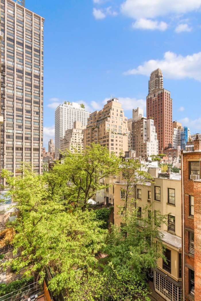 150 East 72nd Street, Unit 6S Manhattan, NY 10021 - Photo 22 of 23 a view of city with tall buildings