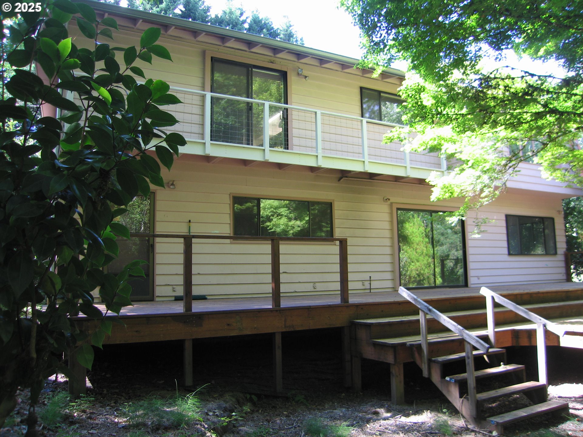 18795 Southwest Vista Street Beaverton, OR 97003 - Photo 25 of 31 a side view of a house with a yard