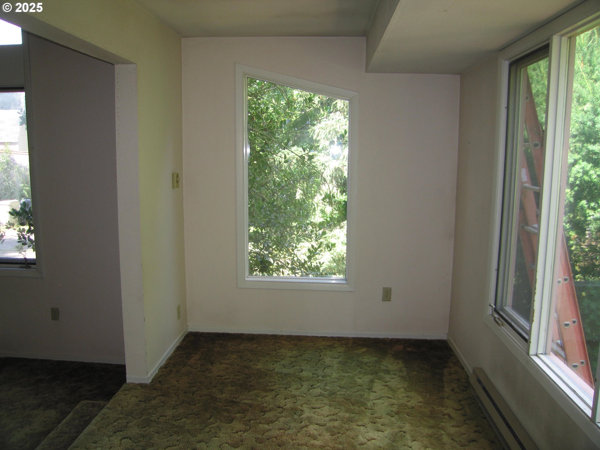 18795 Southwest Vista Street Beaverton, OR 97003 - Photo 6 of 31 a view of a window in an empty room