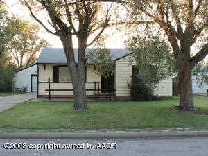 4407 South Lipscomb Street Amarillo, TX 79110 - Photo 1 of 1 a front view of a house with garden