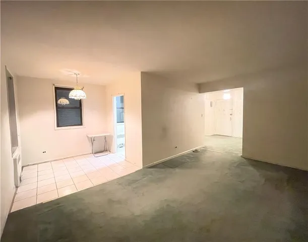 a view of a livingroom with a flat screen tv