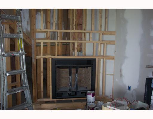 599 Slippery Rock Road Slippery Rock, PA 16057 - Photo 11 of 13 Den/Family/Great Room. heat-producing fireplace - almost finished. The rest of the room is drywalled, mudded and sanded - ready for you to customize