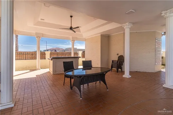 a view of a livingroom with furniture window and wooden floor