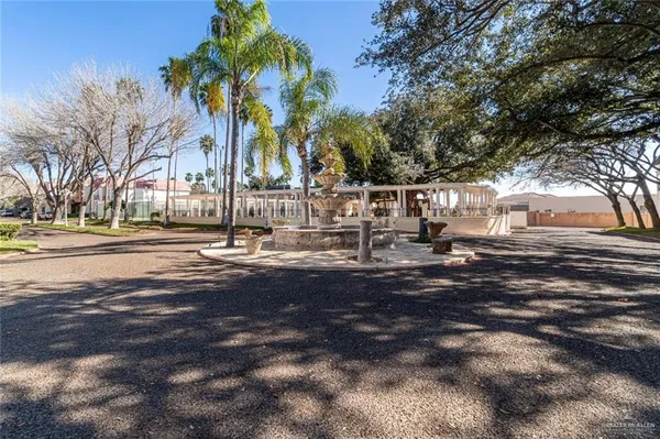 a view of road with residential houses
