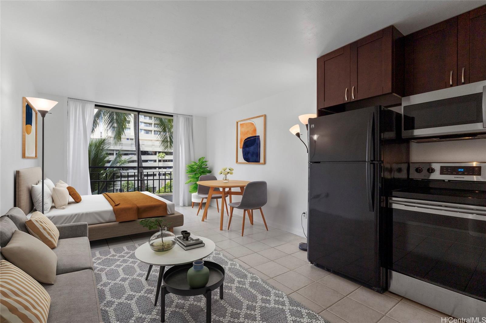 440 Seaside Avenue, Unit 407 Honolulu, HI 96815 - Photo 1 of 1 a living room with furniture and a window