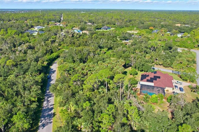 a view of a garden with an outdoor space
