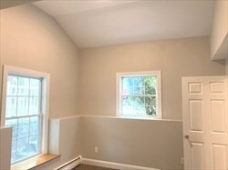 5 Shafter Street, Unit 1 Boston, MA 02121 - Photo 5 of 5 a view of a small space with wooden floor and a window