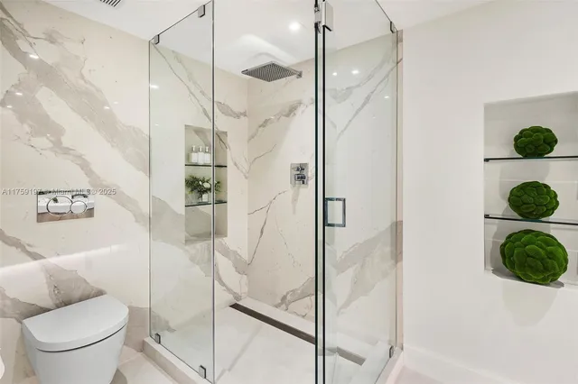 a vase of flowers sitting on a table