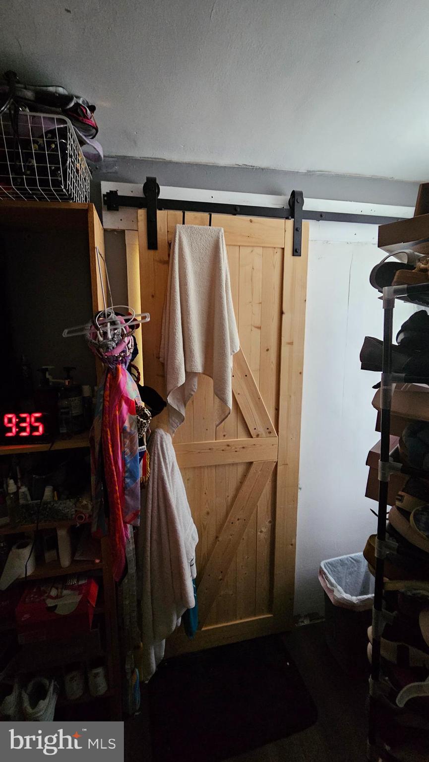 4254 O Street Philadelphia, PA 19124 - Photo 14 of 29 a view of walk in closet with clothes and shoes