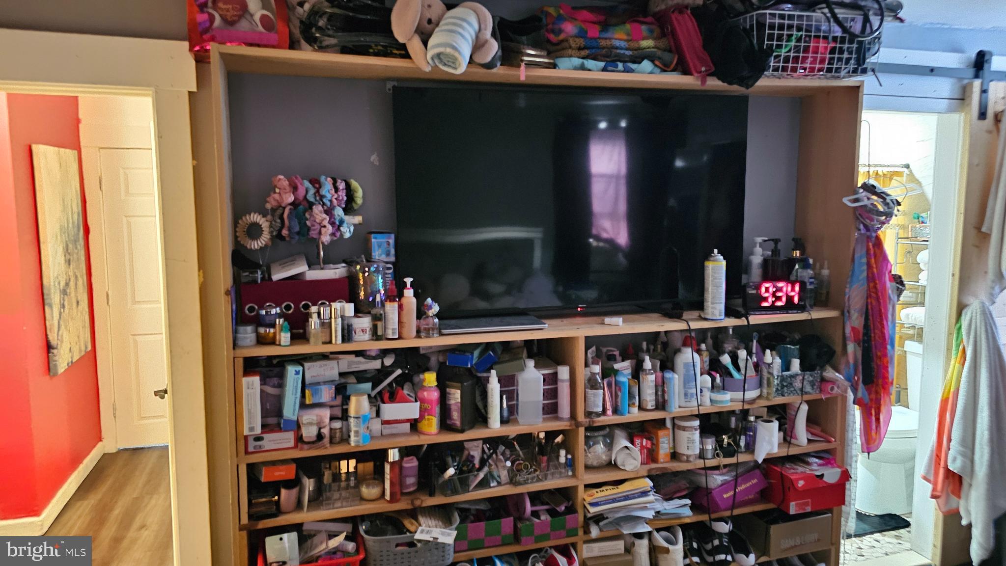 4254 O Street Philadelphia, PA 19124 - Photo 15 of 29 a shelf with books and knick knacks on it