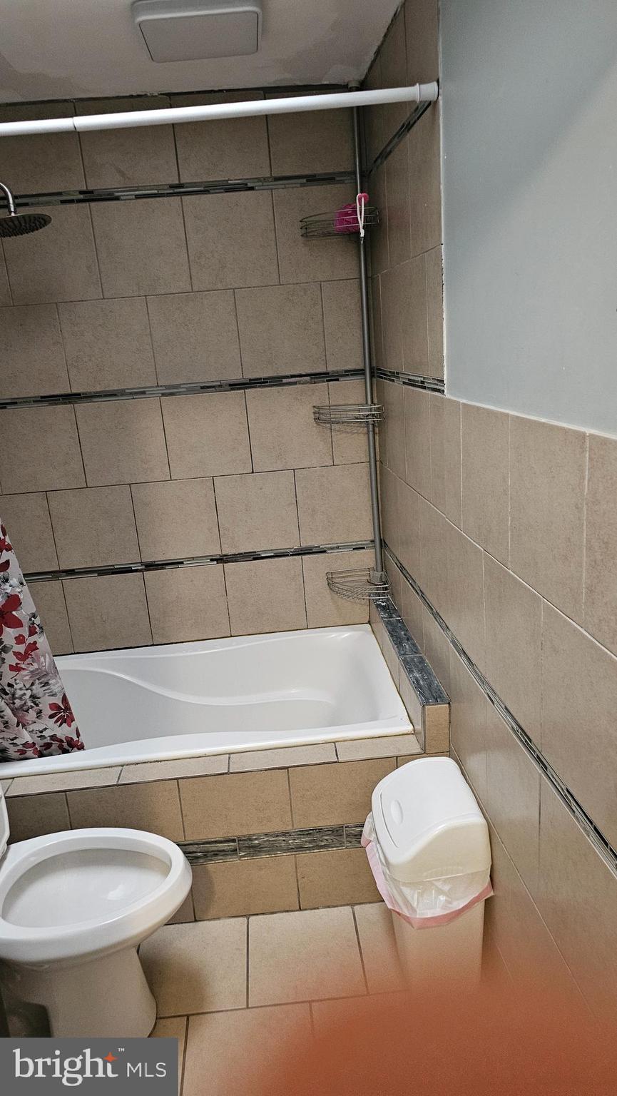 4254 O Street Philadelphia, PA 19124 - Photo 19 of 29 a bathroom with a toilet and a shower