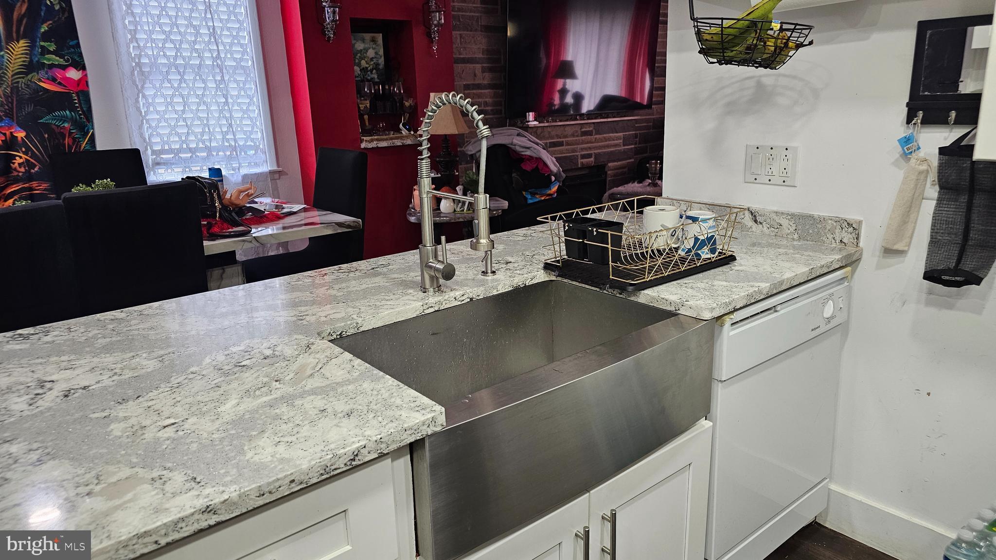 4254 O Street Philadelphia, PA 19124 - Photo 25 of 29 a kitchen with a sink and a stove top oven