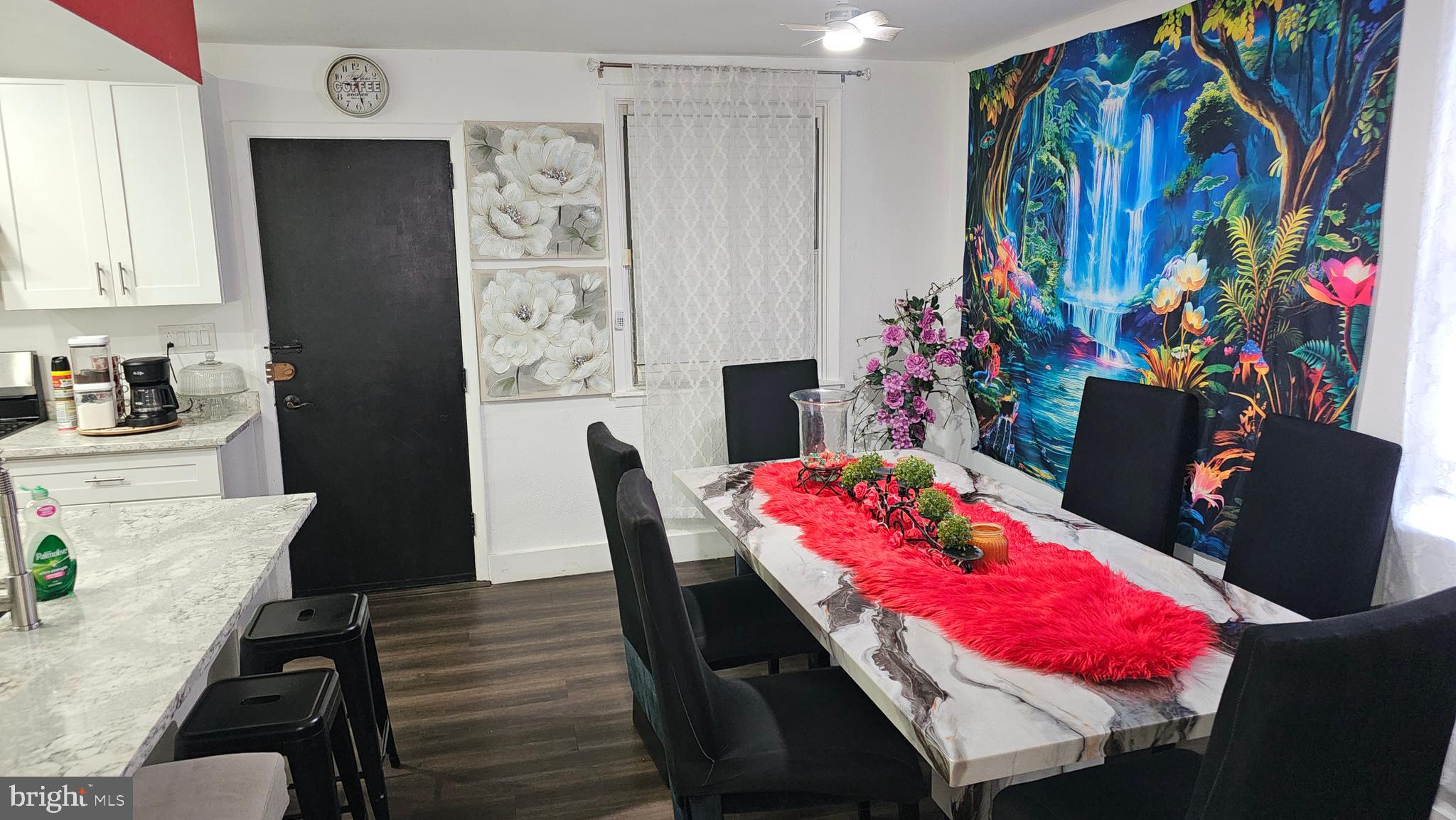 4254 O Street Philadelphia, PA 19124 - Photo 28 of 29 a view of a dining room with furniture and wooden floor