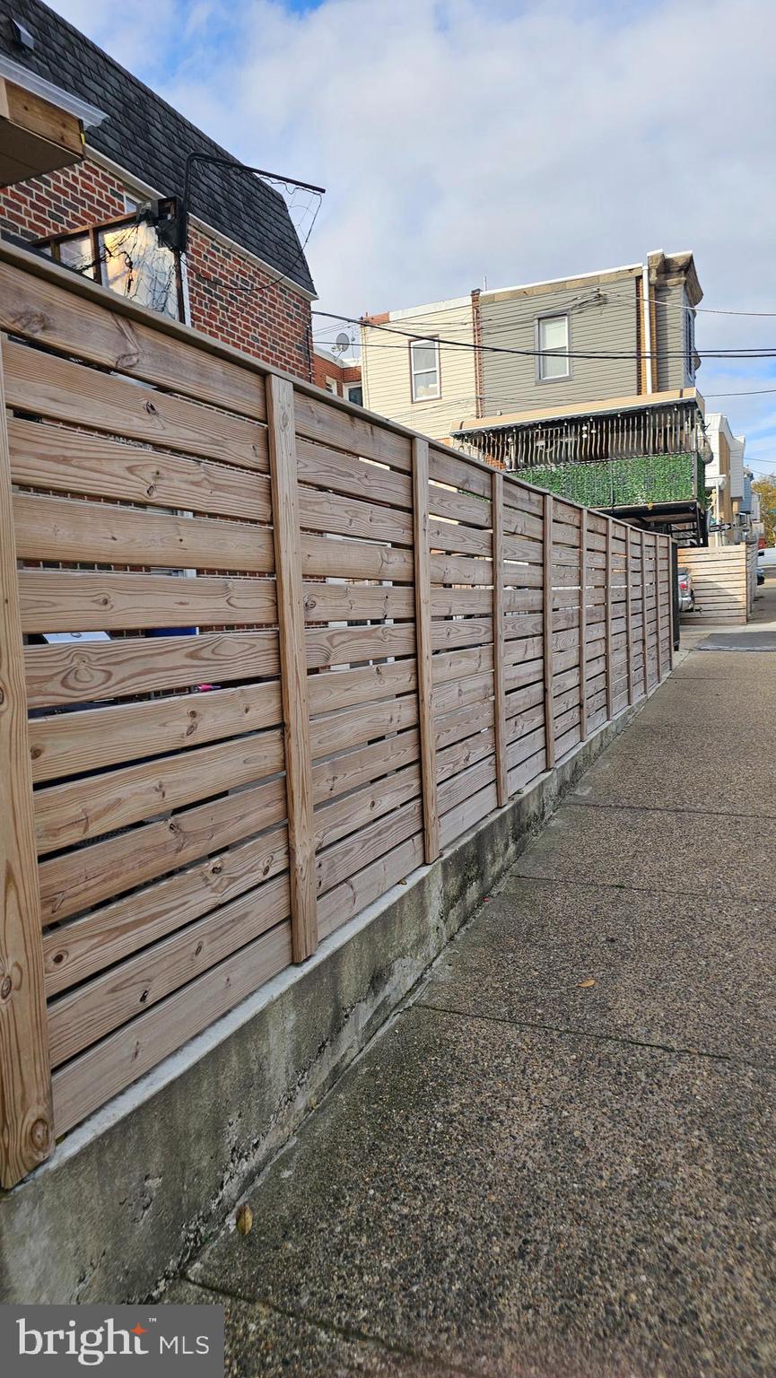 4254 O Street Philadelphia, PA 19124 - Photo 5 of 29 a view of a house with a wooden deck
