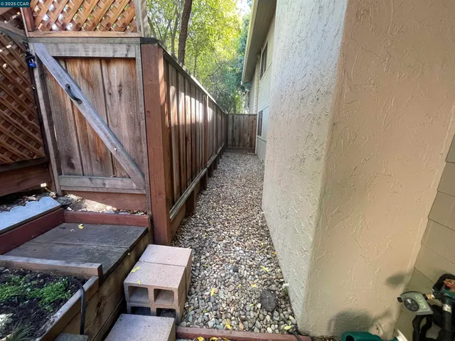 a balcony with wooden floor