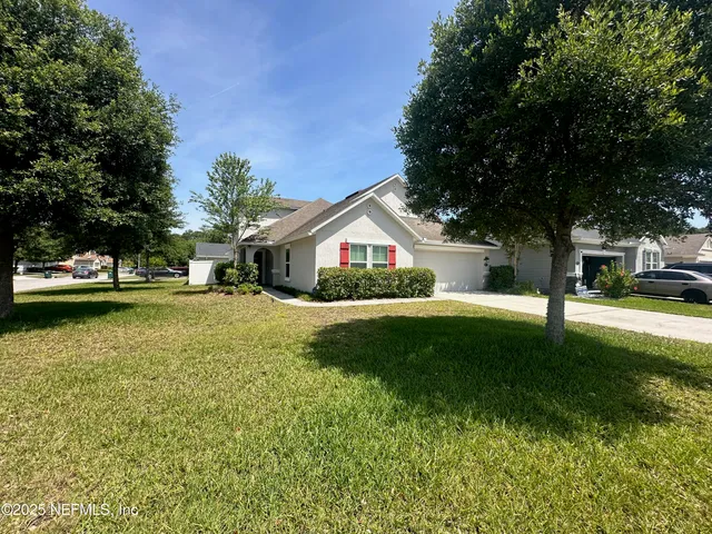 a view of house with outdoor space