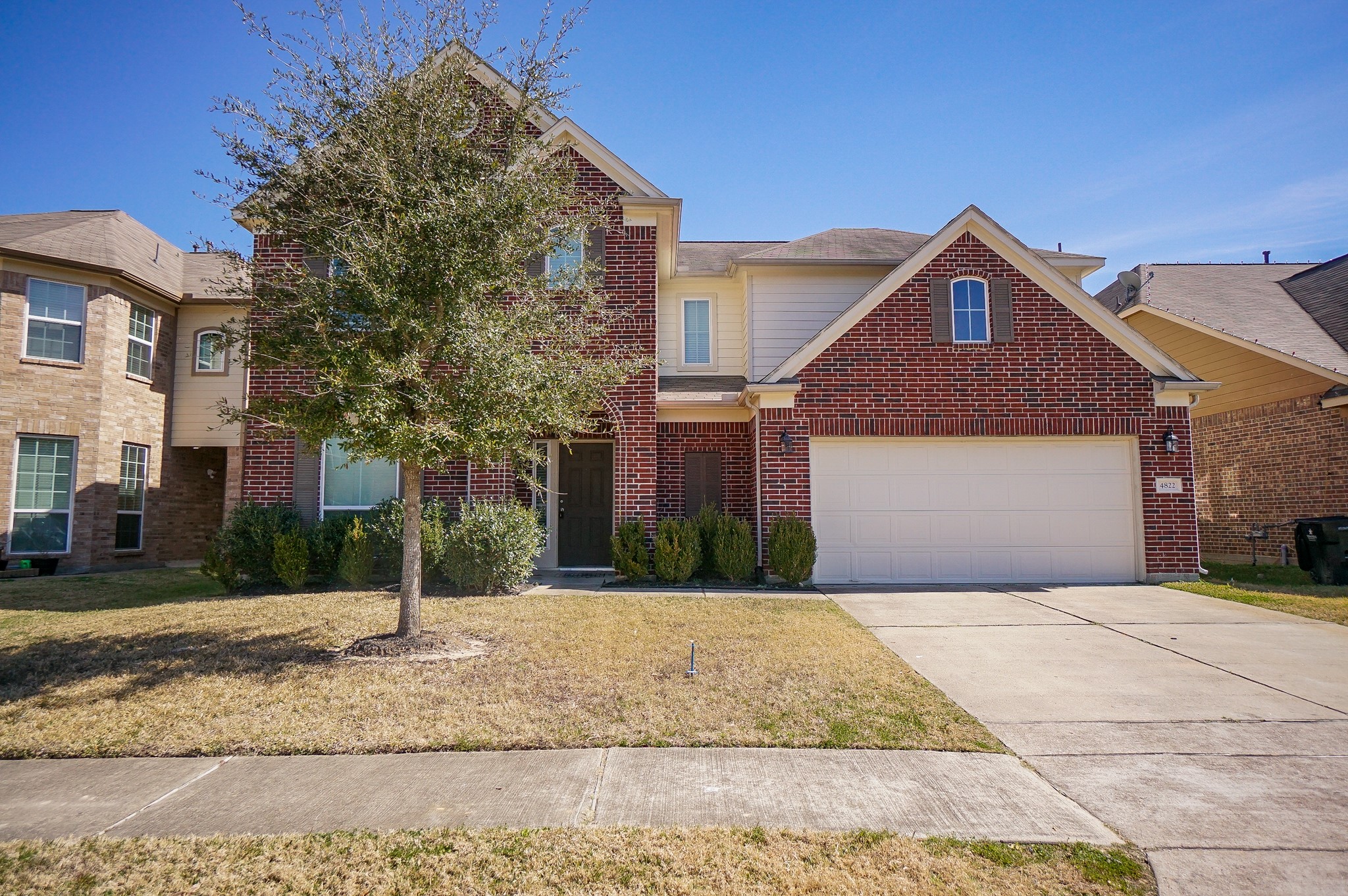 4822 Gingham Check Court Katy, TX 77449 - Photo 1 of 30 a front view of a house with a yard and garage