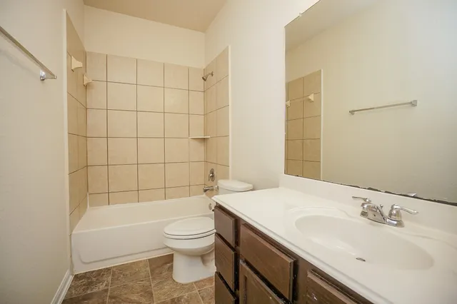 a bathroom with a sink and toilet